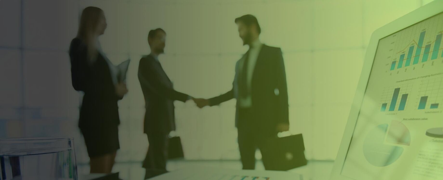 Three people are greeting each other at a business meeting. A laptop with important data is visible on the right side of the picture.